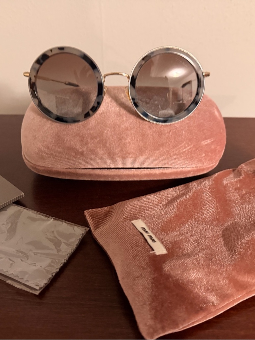Miu Miu Round Sunglasses with Tortoiseshell-Trim and Black Lenses